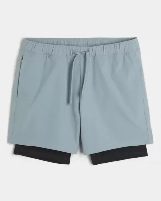 Hybrid-Aktivshorts bis zur Mitte des Oberschenkels