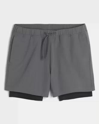 Hybrid-Aktivshorts bis zur Mitte des Oberschenkels