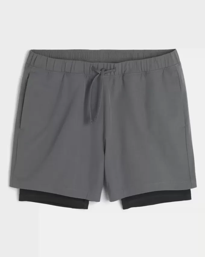 Hybrid-Aktivshorts bis zur Mitte des Oberschenkels