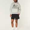 Hybrid-Aktivshorts bis zur Mitte des Oberschenkels