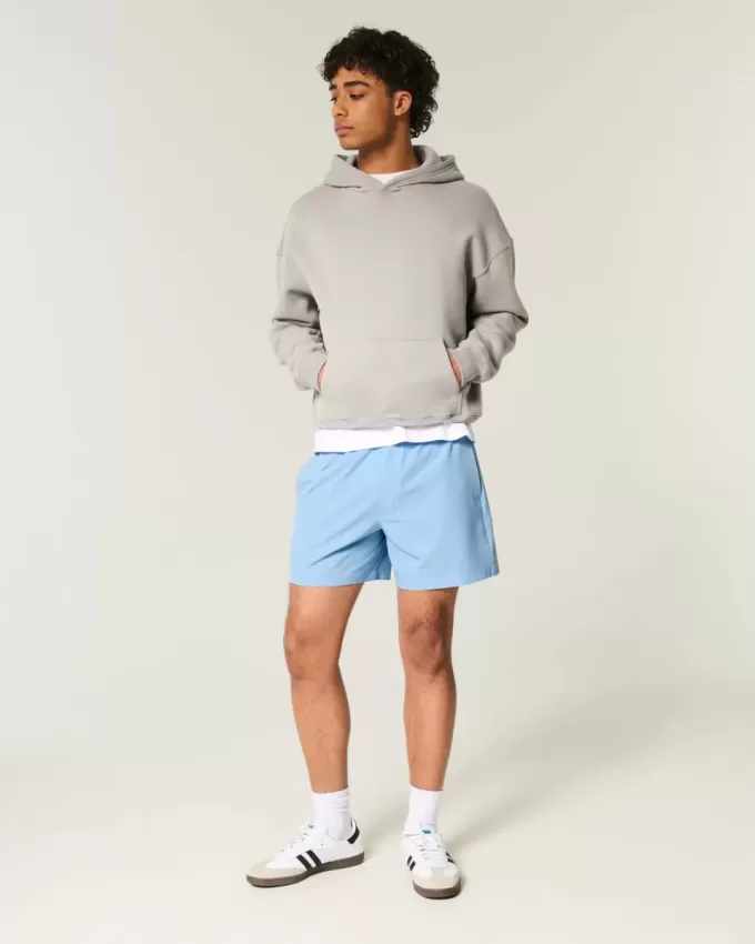 Hybrid-Aktivshorts bis zur Mitte des Oberschenkels
