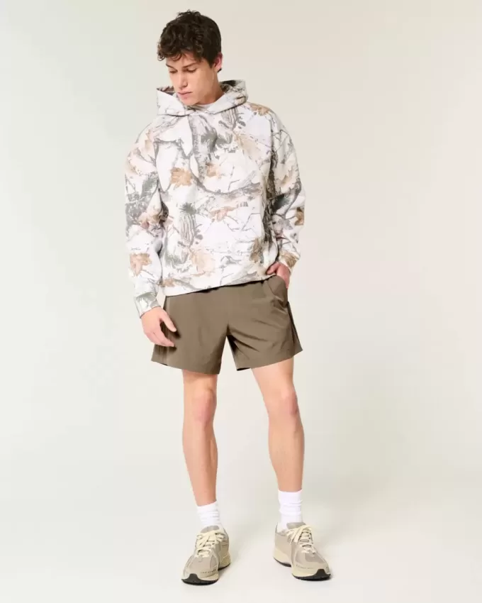 Hybrid-Aktivshorts bis zur Mitte des Oberschenkels