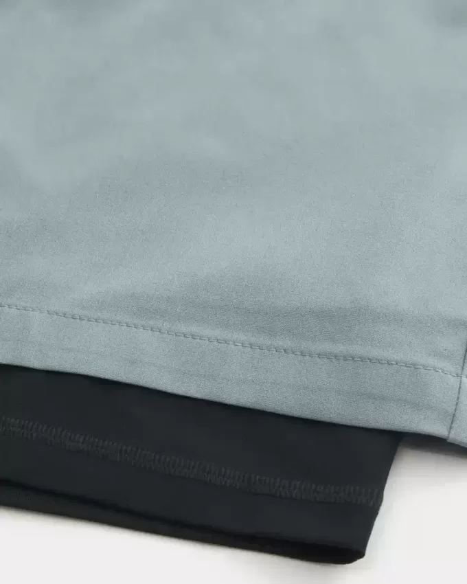 Hybrid-Aktivshorts bis zur Mitte des Oberschenkels