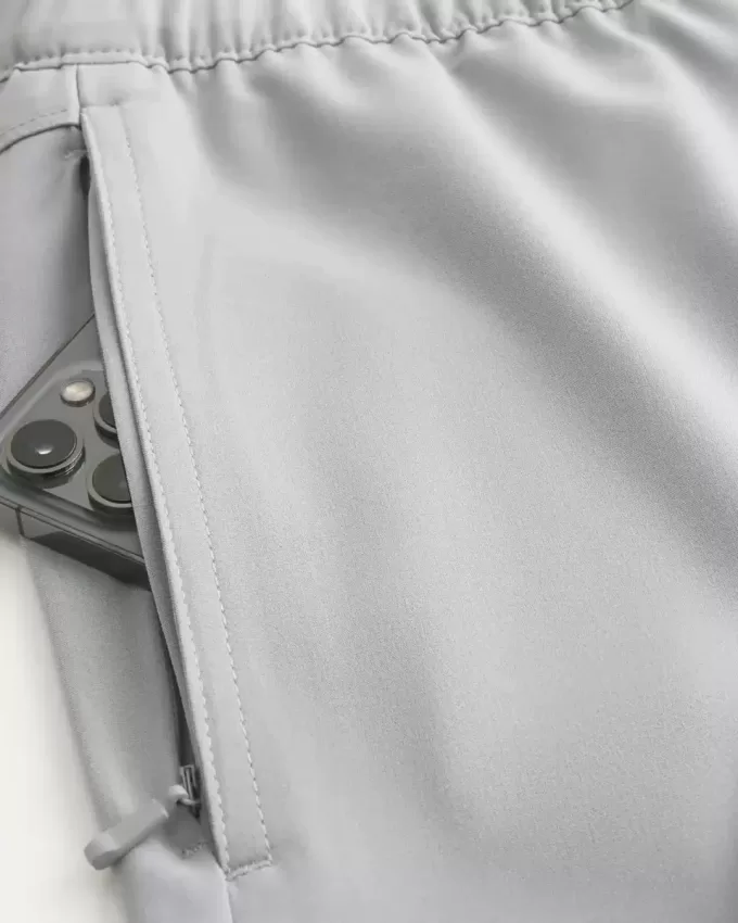 Hybrid-Aktivshorts bis zur Mitte des Oberschenkels