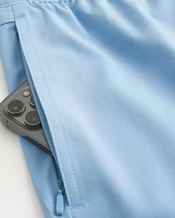 Hybrid-Aktivshorts bis zur Mitte des Oberschenkels