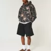 Kastenförmiger Kapuzenpullover mit Camouflage-Muster Kastenförmiger Kapuzenpullover mit Camouflage-Muster