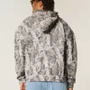 Kastenförmiger Kapuzenpullover mit Camouflage-Muster und Reißverschluss