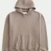 Kastenförmiger Kapuzenpullover mit Kontraststichen Kastenförmiger Kapuzenpullover mit Kontraststichen