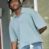 Kastenförmiges, kurzes Poloshirt Kastenförmiges, kurzes Poloshirt