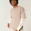 Kastenförmiges, schweres T-Shirt mit Rundhalsausschnitt aus gewaschener Baumwolle Kastenförmiges, schweres T-Shirt mit Rundhalsausschnitt aus gewaschener Baumwolle