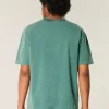 Kastenförmiges, schweres T-Shirt mit Rundhalsausschnitt aus gewaschener Baumwolle Kastenförmiges, schweres T-Shirt mit Rundhalsausschnitt aus gewaschener Baumwolle