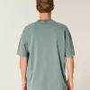 Kastenförmiges, schweres T-Shirt mit Rundhalsausschnitt aus gewaschener Baumwolle Kastenförmiges, schweres T-Shirt mit Rundhalsausschnitt aus gewaschener Baumwolle