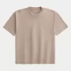 Kastenförmiges, schweres T-Shirt mit Rundhalsausschnitt aus gewaschener Baumwolle Kastenförmiges, schweres T-Shirt mit Rundhalsausschnitt aus gewaschener Baumwolle