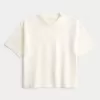 Kastiges, schweres, kurzes T-Shirt mit Rundhalsausschnitt Kastiges, schweres, kurzes T-Shirt mit Rundhalsausschnitt