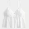 Leicht besticktes Babydoll-Oberteil mit Glanz Leicht besticktes Babydoll-Oberteil mit Glanz