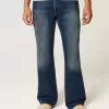 Lockere Bootcut-Jeans in dunkler Waschung Lockere Bootcut-Jeans in dunkler Waschung