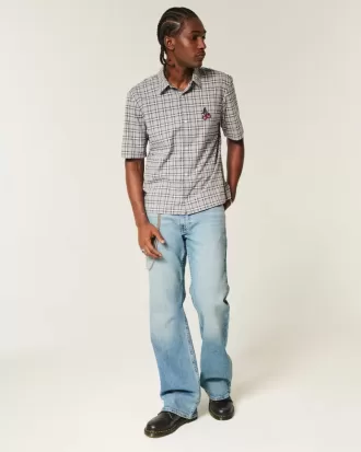 Lockere Bootcut-Jeans in mittlerer Waschung Lockere Bootcut-Jeans in mittlerer Waschung