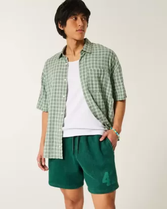 Lockere Fleece-Shorts mit Grafik bis zur Mitte des Oberschenkels