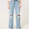 Lockere Jeans mit niedrigem Bund und Rissen in heller Waschung Lockere Jeans mit niedrigem Bund und Rissen in heller Waschung