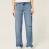 Lockere Jeans mit niedrigem Bund und Rissen in mittlerer Waschung Lockere Jeans mit niedrigem Bund und Rissen in mittlerer Waschung