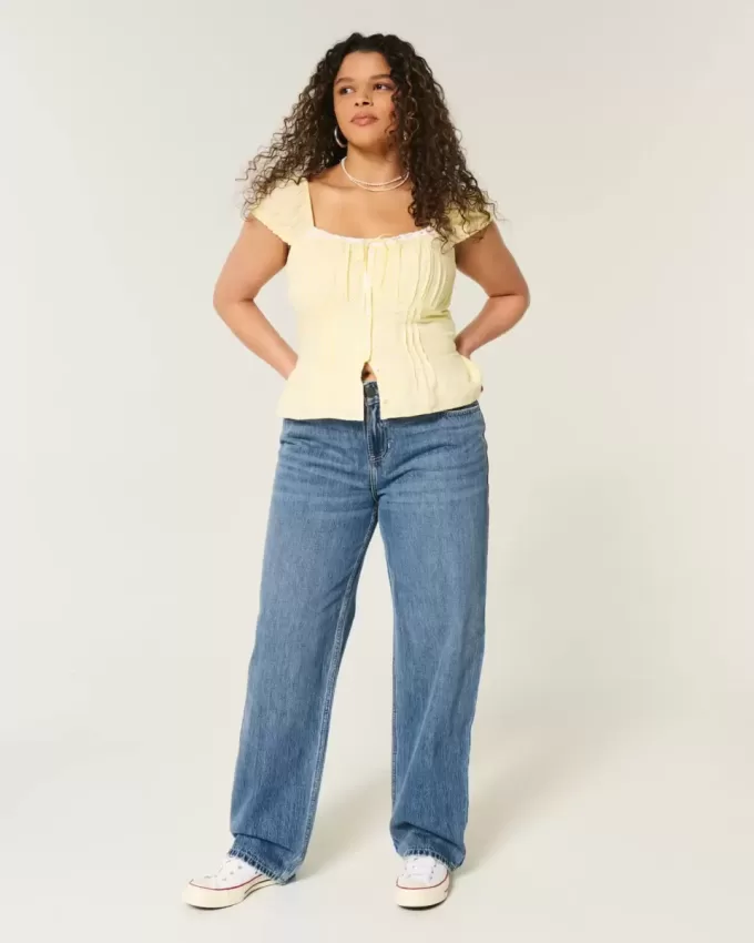 Lockere Jeans mit niedriger Taille und mittlerer Waschung Lockere Jeans mit niedriger Taille und mittlerer Waschung
