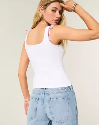 Low-Rise Baggy-Jeans mit Blumenstickerei in mittlerer Waschung