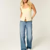 Low-Rise Baggy-Jeans mit mittlerer Waschung und Nietenherzen Low-Rise Baggy-Jeans mit mittlerer Waschung und Nietenherzen