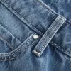 Low-Rise Baggy-Jeans mit mittlerer Waschung und Nietenherzen Low-Rise Baggy-Jeans mit mittlerer Waschung und Nietenherzen