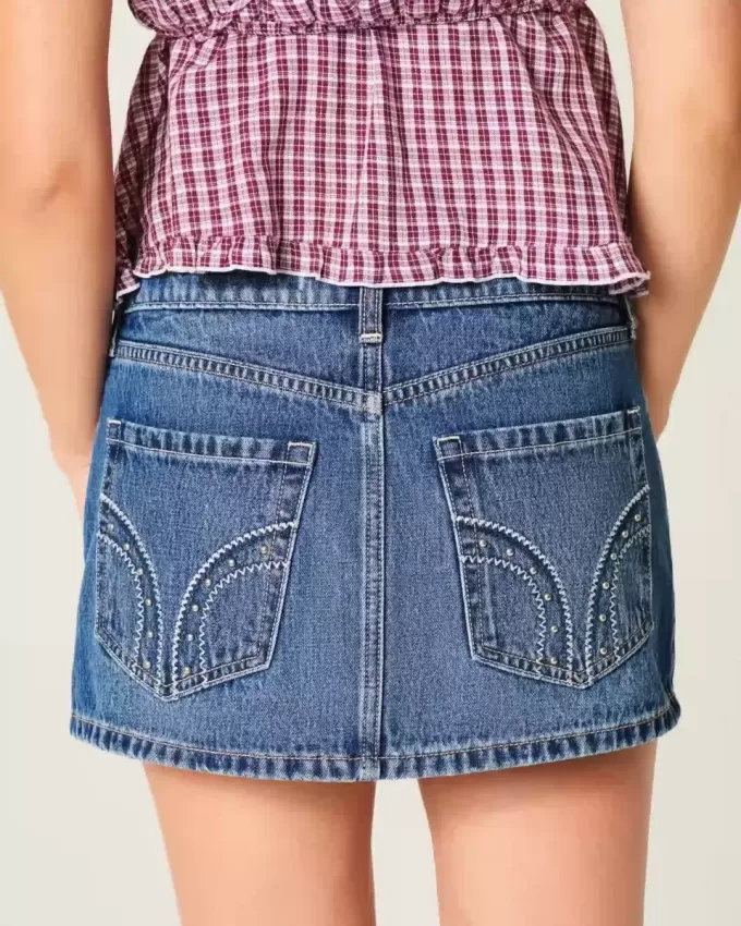 Low-Rise-Mini-Skort aus Denim mit Nieten