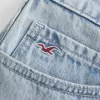 Low-Rise-Mini-Skort aus hell gewaschenem Denim Low-Rise-Mini-Skort aus hell gewaschenem Denim
