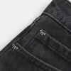 Low-Rise-Mini-Skort aus verwaschenem schwarzem Denim