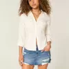 Low-Rise-Mini-Skort aus zerrissenem, dunkel gewaschenem Denim Low-Rise-Mini-Skort aus zerrissenem, dunkel gewaschenem Denim