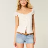 Low-Rise-Shortie-Shorts aus hell gewaschenem Denim Low-Rise-Shortie-Shorts aus hell gewaschenem Denim