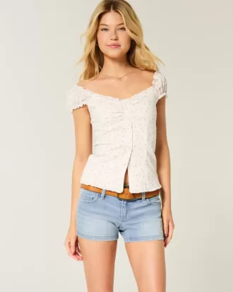 Low-Rise-Shortie-Shorts aus hell gewaschenem Denim