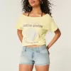 Low-Rise-Shorts aus hell gewaschenem Denim mit Blumenmuster und Tasche Low-Rise-Shorts aus hell gewaschenem Denim mit Blumenmuster und Tasche