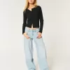 Low-Rise Tapered Baggy Jeans mit mittlerer Waschung Low-Rise Tapered Baggy Jeans mit mittlerer Waschung