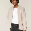 Lässiger Pullover mit Reißverschluss und Zahlengrafik