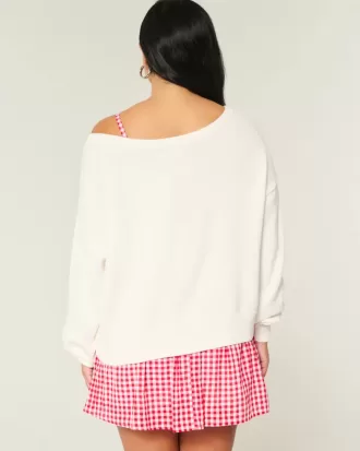 Lässiger, schulterfreier Pullover mit Flaggen- und Herzgrafik