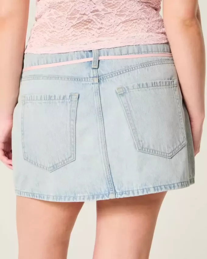 Mini-Skort aus Denim mit heller Waschung und Schnürsenkeln Mini-Skort aus Denim mit heller Waschung und Schnürsenkeln