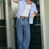 Mittelwaschbare Skater-Baggy-Jeans mit Sterngrafik