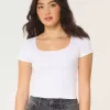 Nahtloses Baby-T-Shirt aus Stoff mit quadratischem Ausschnitt Nahtloses Baby-T-Shirt aus Stoff mit quadratischem Ausschnitt