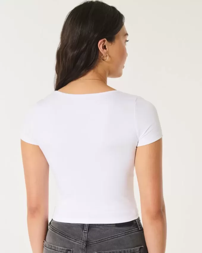 Nahtloses Baby-T-Shirt aus Stoff mit quadratischem Ausschnitt Nahtloses Baby-T-Shirt aus Stoff mit quadratischem Ausschnitt