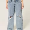 Niedrig geschnittene Baggy-Jeans mit Rissen in mittlerer Waschung