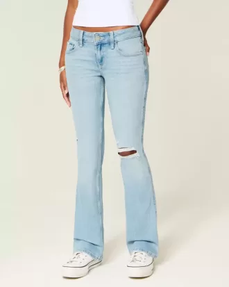 Niedrig geschnittene, zerrissene Bootcut-Jeans in heller Waschung mit Stickerei