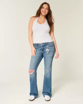 Niedrig sitzende Bootcut-Jeans mit Rissen in mittlerer Waschung