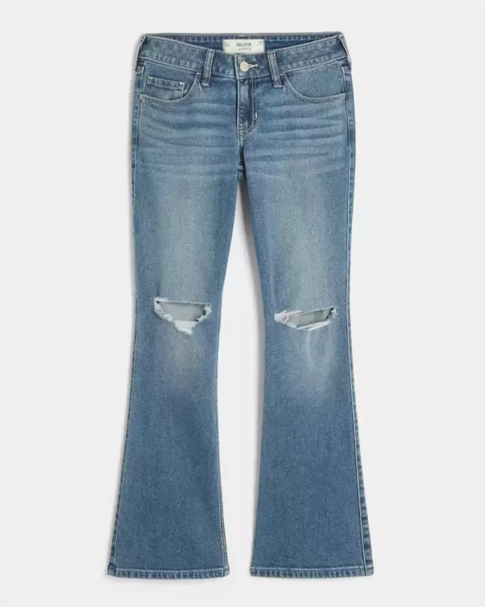 Niedrig sitzende Bootcut-Jeans mit Rissen in mittlerer Waschung