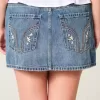 Niedrig sitzender Mini-Skort aus besticktem Denim Niedrig sitzender Mini-Skort aus besticktem Denim