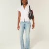 Niedrige Bootcut-Jeans mit mittlerer Waschung und Schmetterlingsstickerei