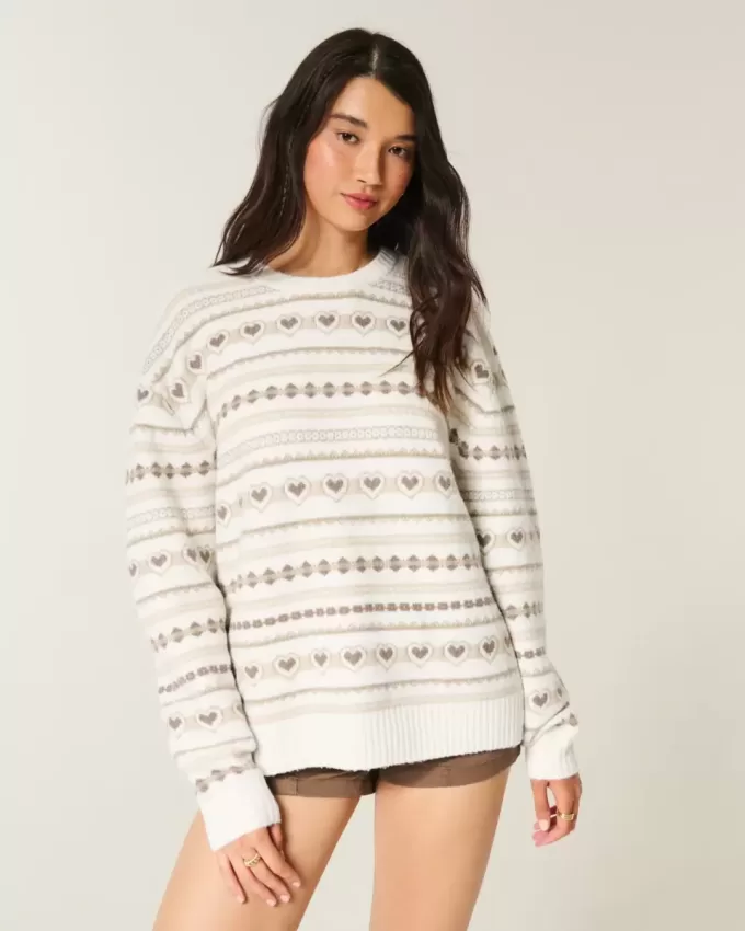 Oversize-Pullover mit Rundhalsausschnitt und Herzmuster Oversize-Pullover mit Rundhalsausschnitt und Herzmuster