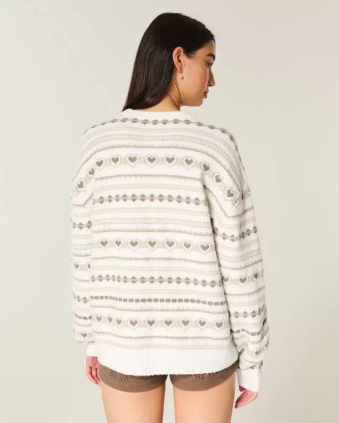 Oversize-Pullover mit Rundhalsausschnitt und Herzmuster Oversize-Pullover mit Rundhalsausschnitt und Herzmuster